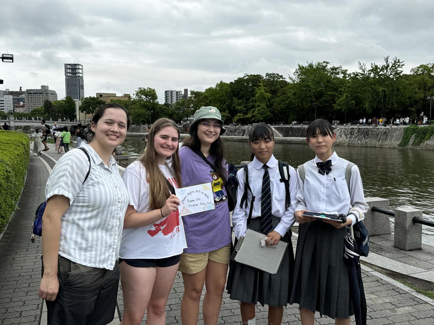 Group photo after the interview by Toyama Junior High School students by the Atomic Bomb Dome. 