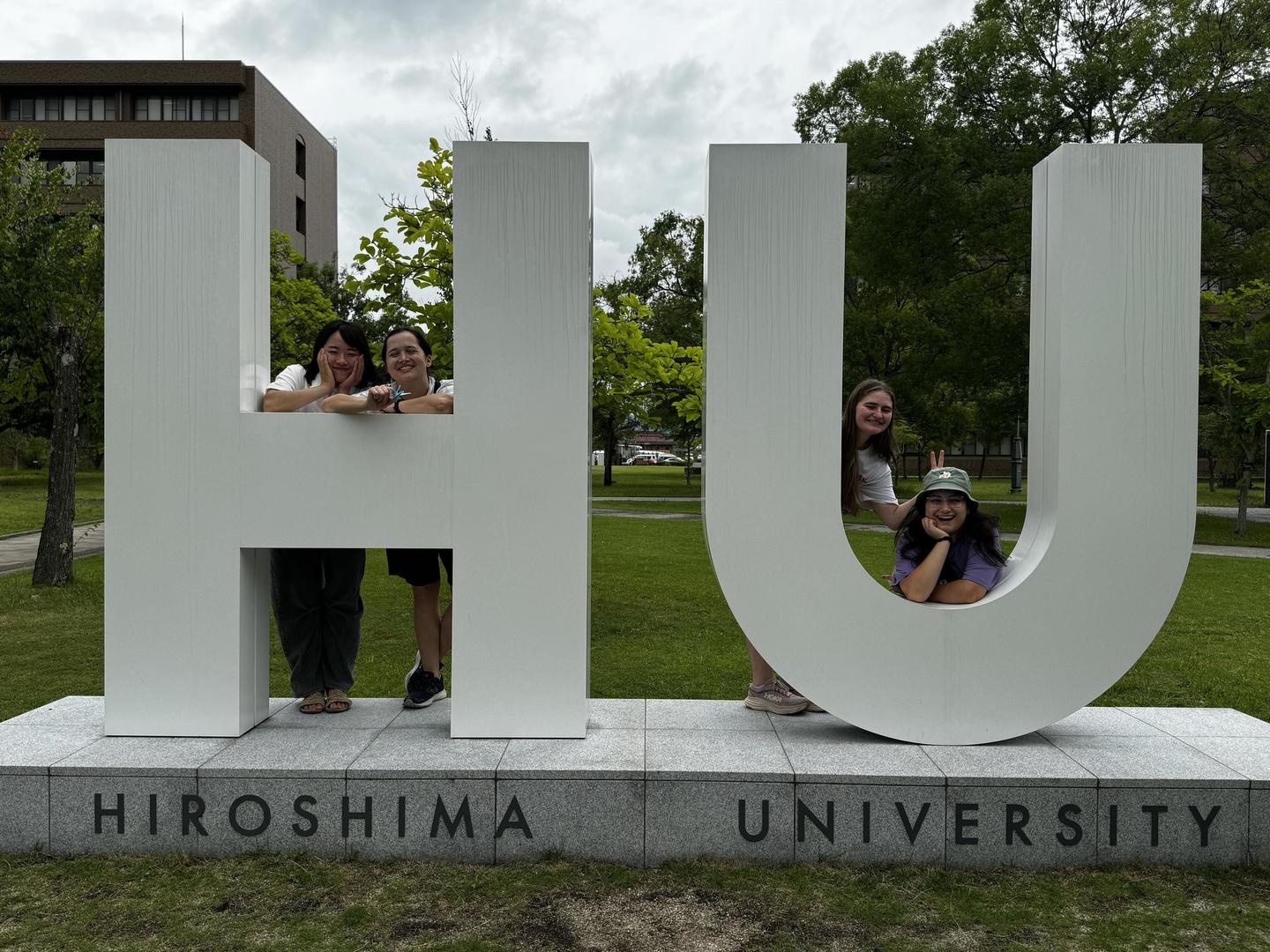 Group photo by the HU monument inside the campus. From the left, Yuri Sawada, Blue Carlsson, Jessica Lambert, and Ella Weber. 