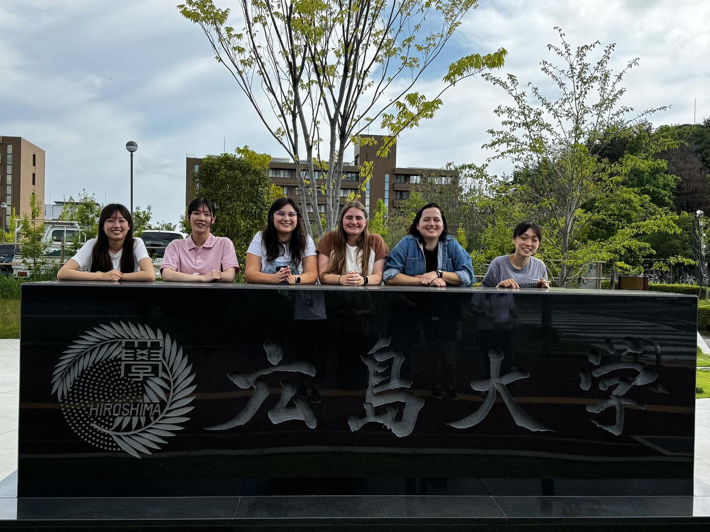 Group photo at the Hiroshima University Entrance. From the left, Iroha Kitazono, Miyu Azuma, Ella Weber, Jessica Lambert, Blue Carlsson, and Yuka Fukuhara. 
